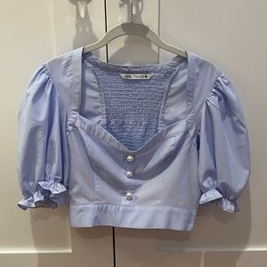 Blue Zara cropped blouse with puff sleeves and pearl buttons, size medium